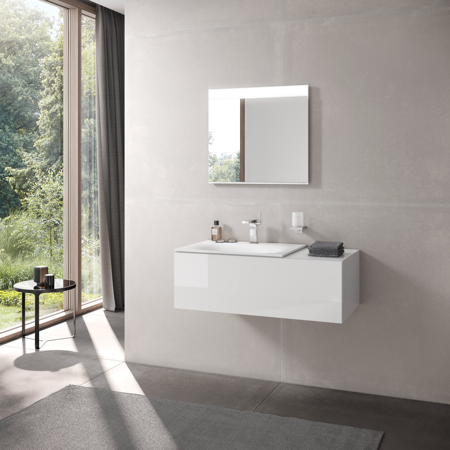 Vasque avec soubassement, mitigeur mécanique et accessoires de l’EDITION 11, avec miroir lumineux de l’EDITION 400.